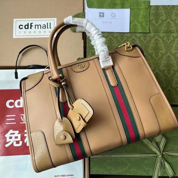 G*u*i top handle bags